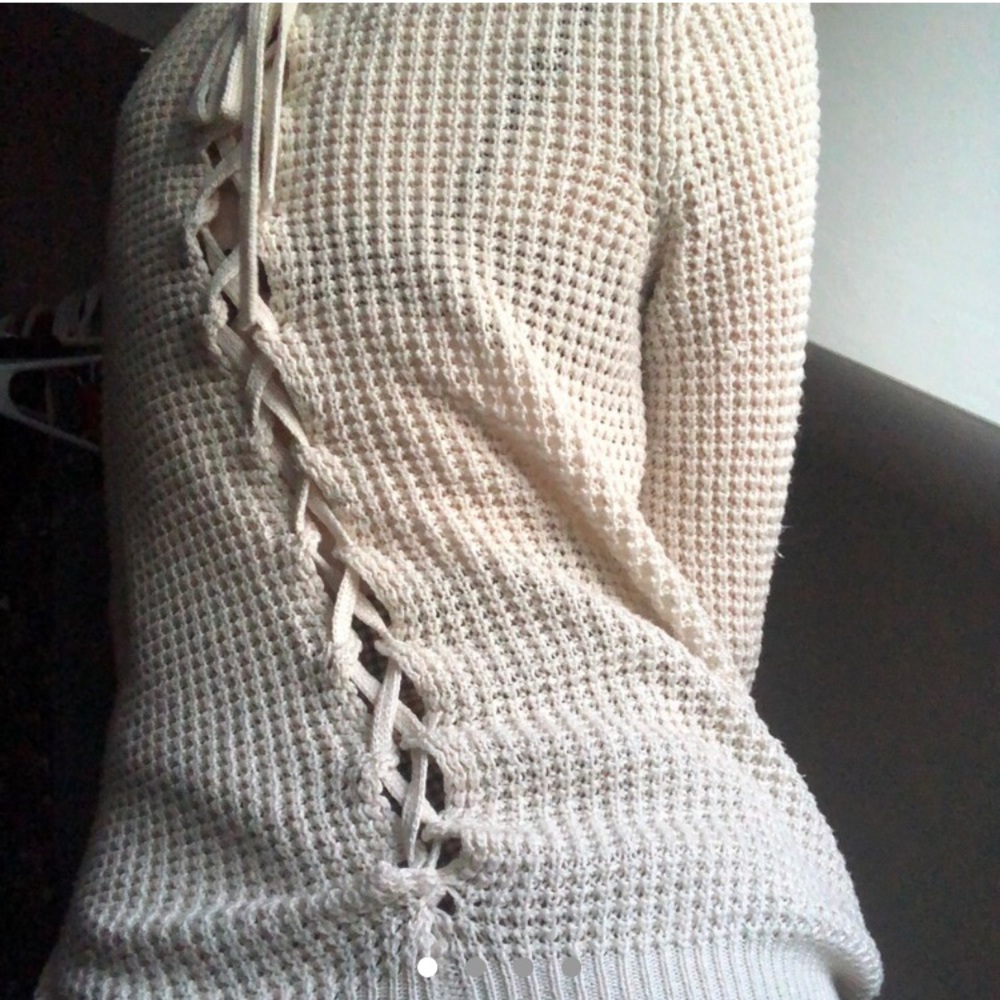 Cream coloured sweater with corset back